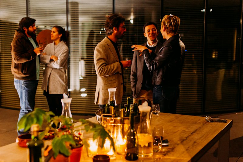 Guests talking at an evening reception